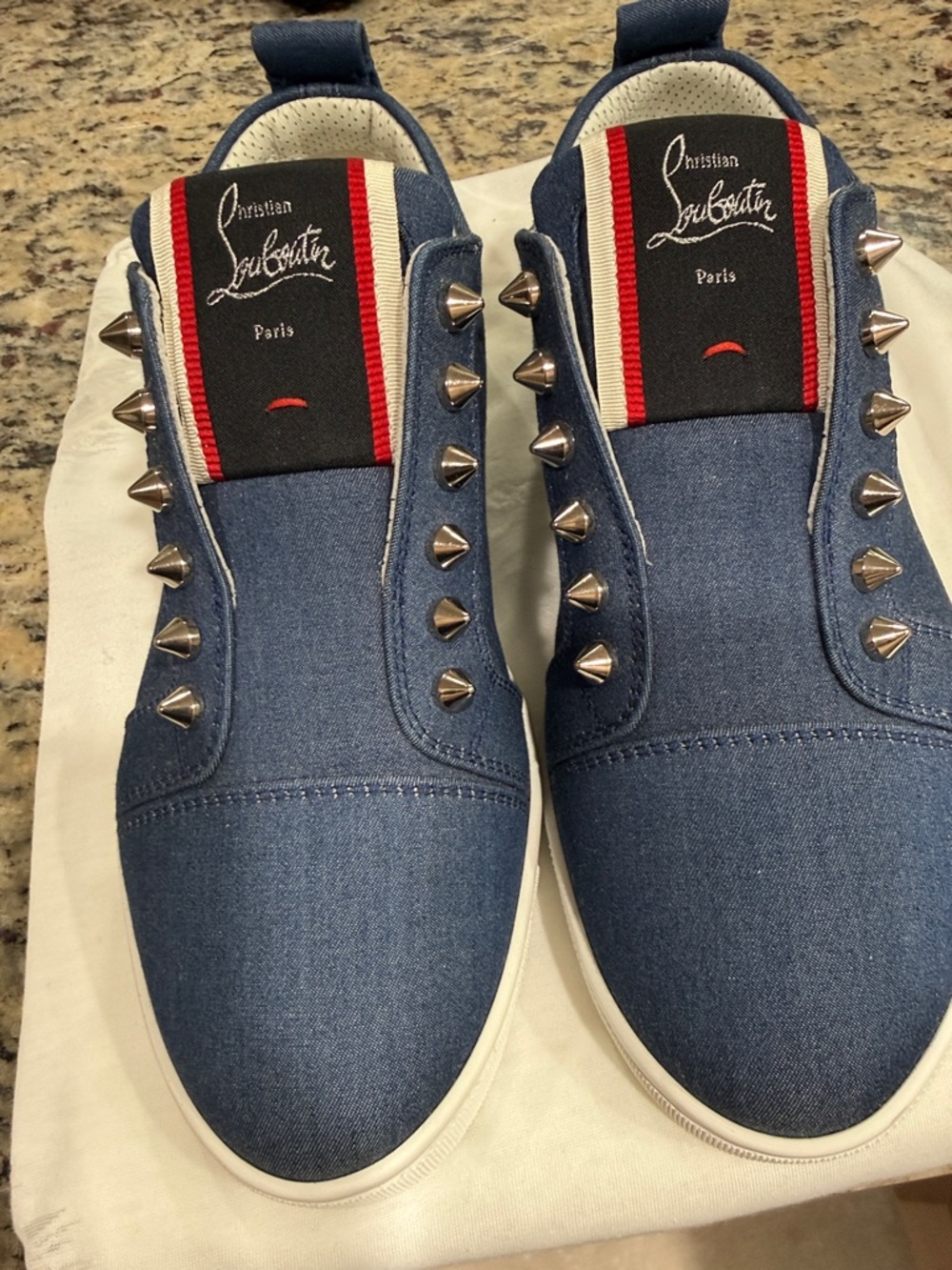 Christian Louboutin Blue Denim Spike Slip-On Sneakers with Red and Black Accents